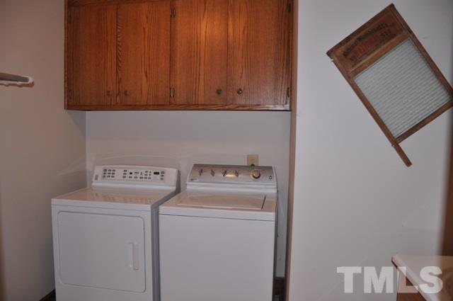708 Sandown Place Raleigh, NC 27615 - Photo 21 of 25 a utility room with dryer and washer