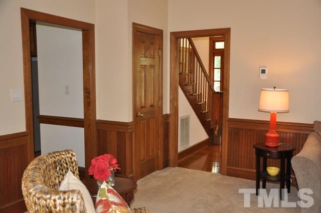 708 Sandown Place Raleigh, NC 27615 - Photo 4 of 25 a living room with furniture and a window