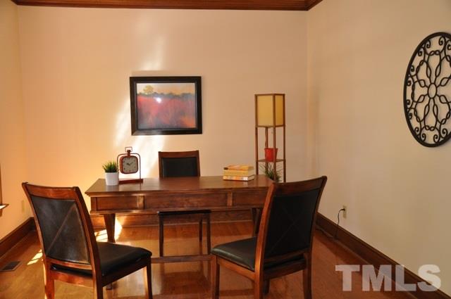 708 Sandown Place Raleigh, NC 27615 - Photo 5 of 25 a view of a workspace with furniture