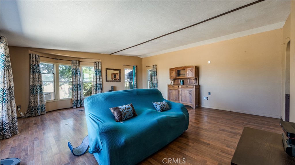 39550 Kirby Road Anza, CA 92539 - Photo 12 of 53 a living room with furniture window and wooden floor