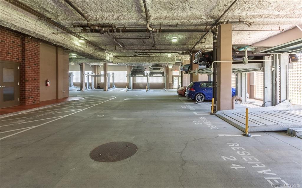 715 North Graham Street, Unit 604 Charlotte, NC 28202 - Photo 15 of 21 a view of a flesh screen tv