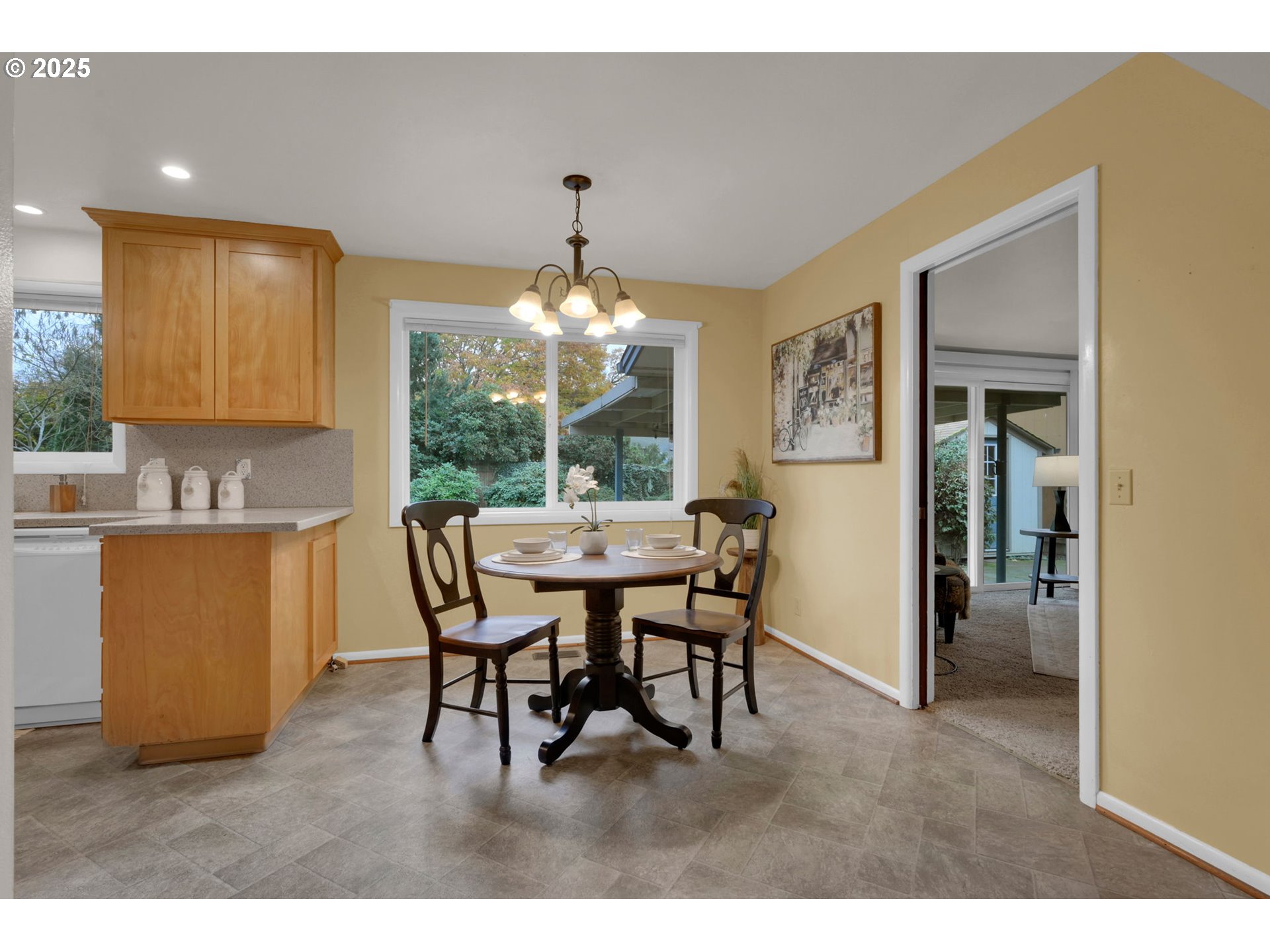 240 Dibblee Lane Eugene, OR 97404 - Photo 16 of 42 a dining room with furniture and chandelier