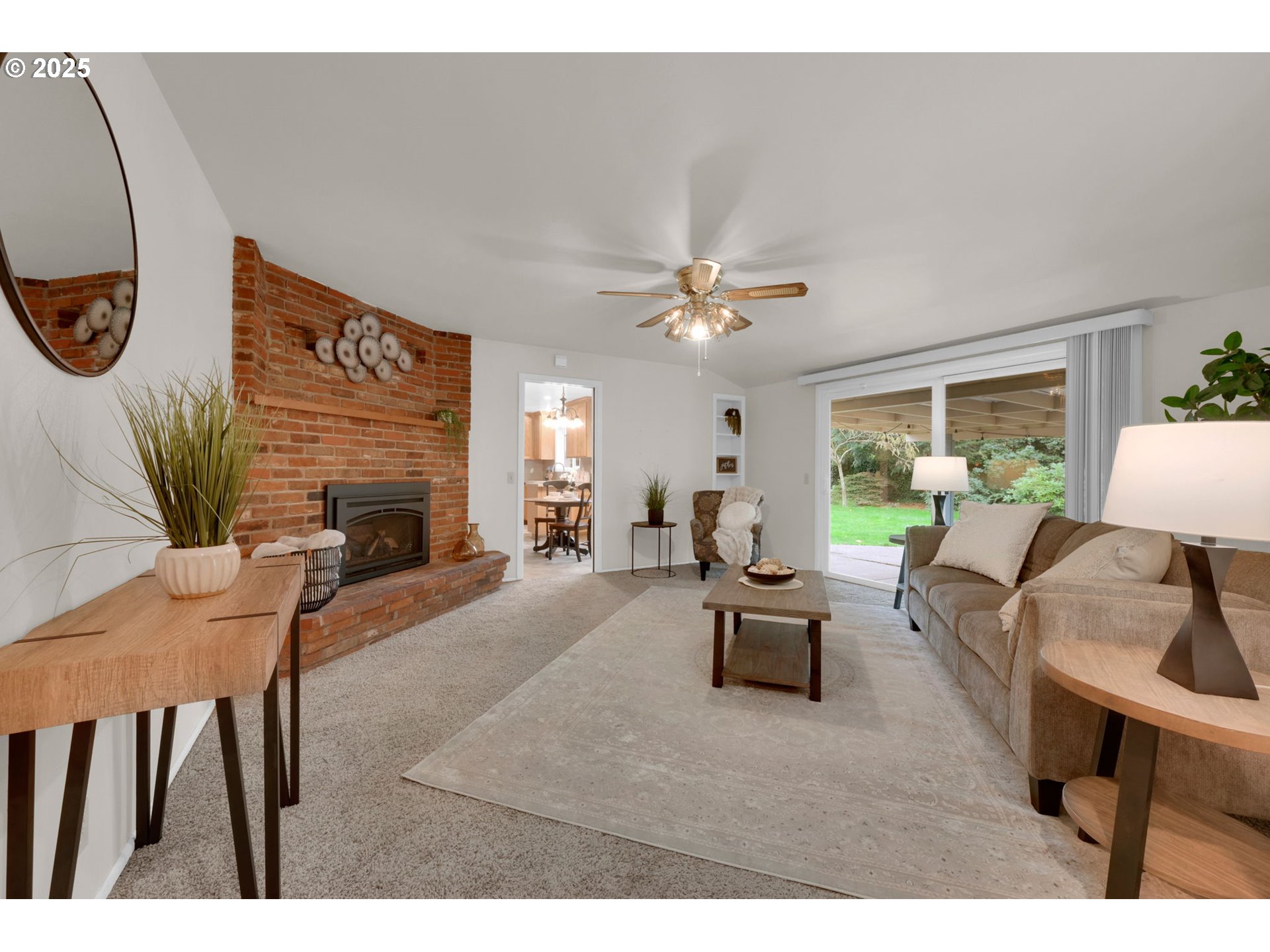 240 Dibblee Lane Eugene, OR 97404 - Photo 19 of 42 a living room with furniture and a fireplace