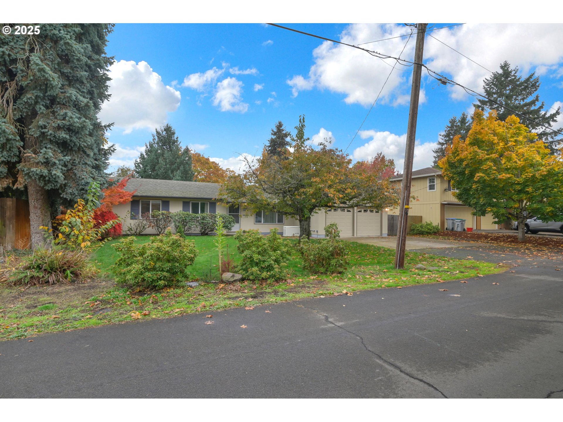 240 Dibblee Lane Eugene, OR 97404 - Photo 3 of 42 a view of a house with a yard