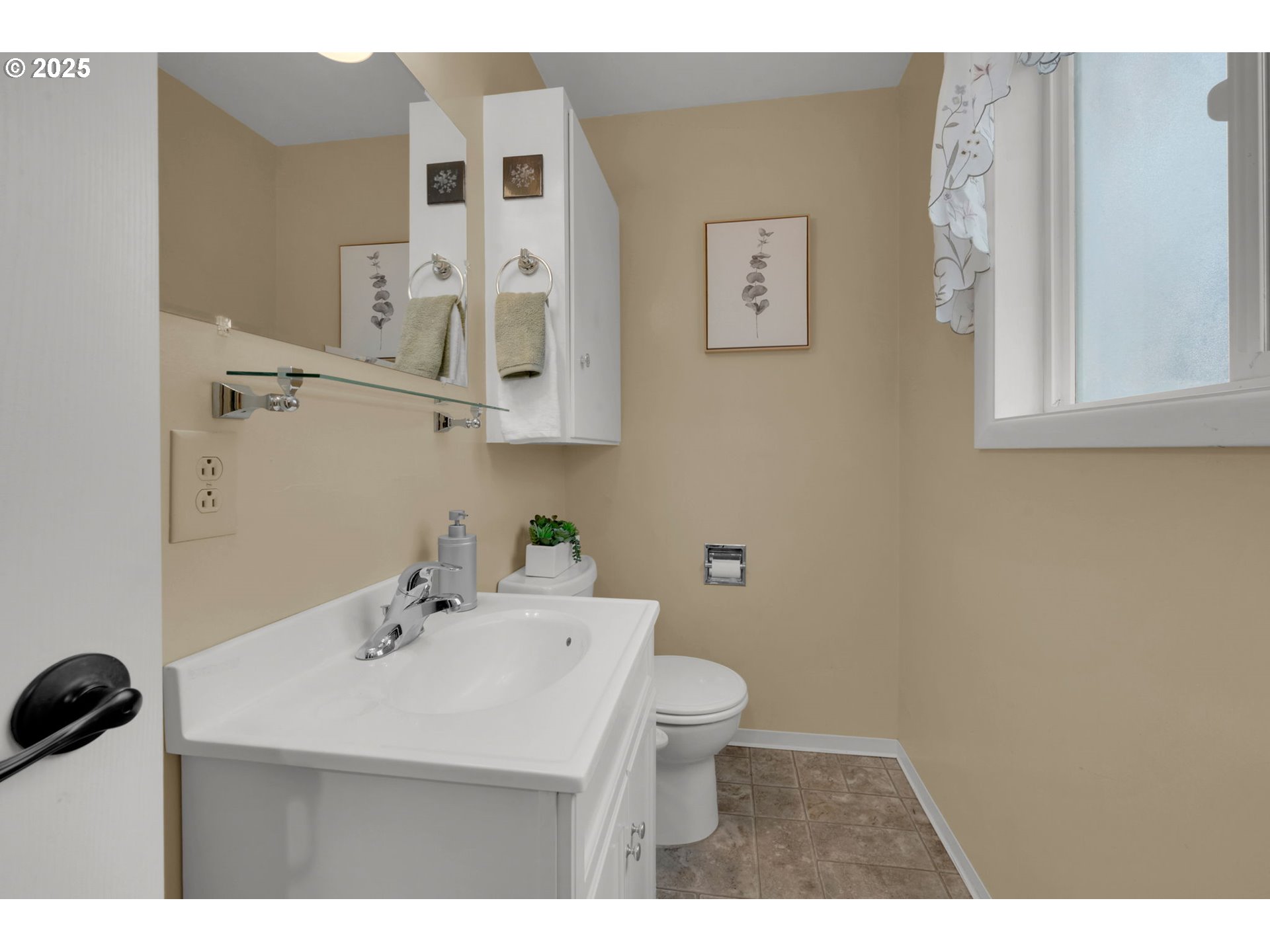 240 Dibblee Lane Eugene, OR 97404 - Photo 32 of 42 a bathroom with a sink a toilet and mirror