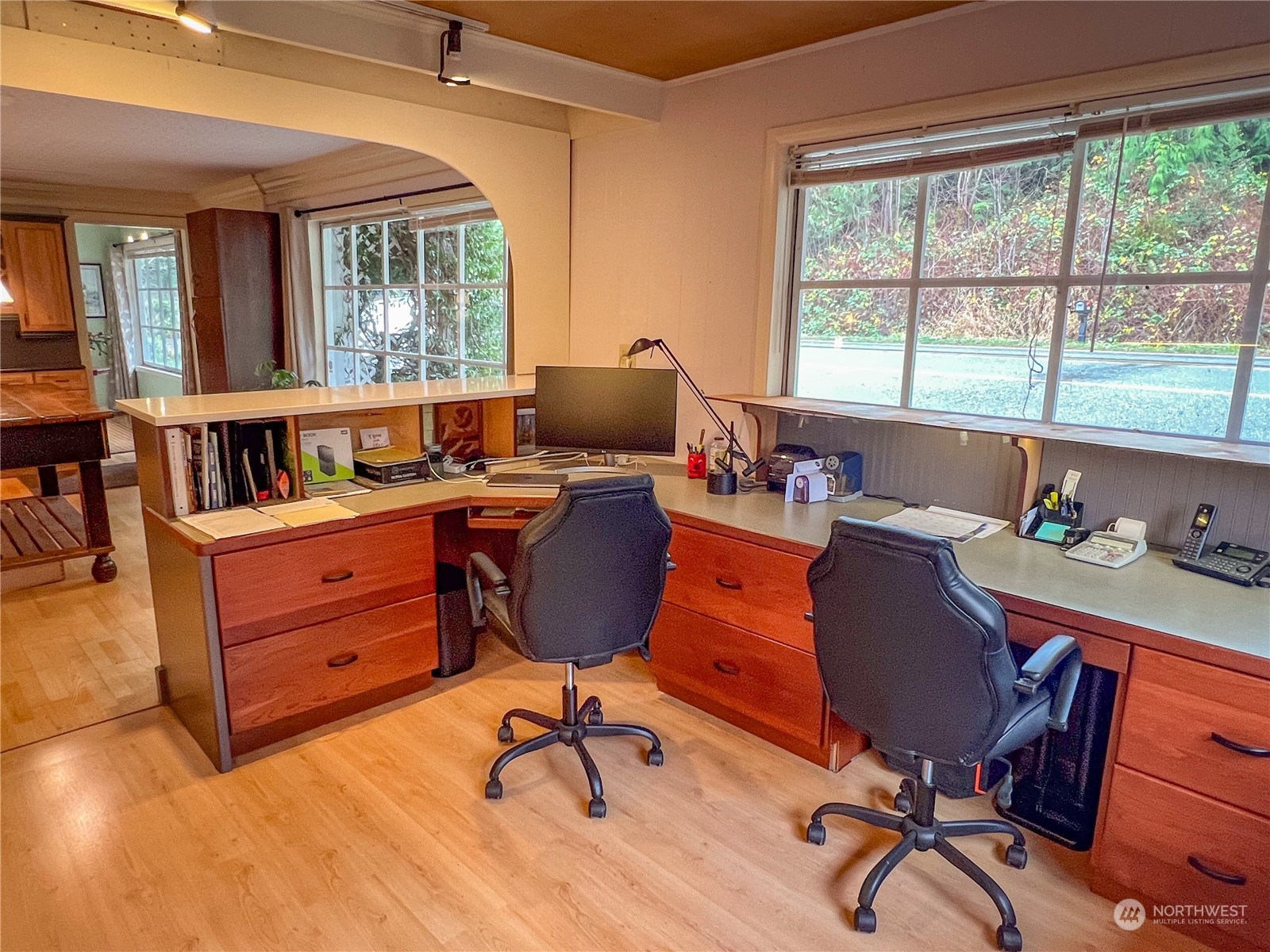 7251 Oak Bay Road Port Ludlow, WA 98365 - Photo 18 of 40 a view of a workspace with furniture and a window