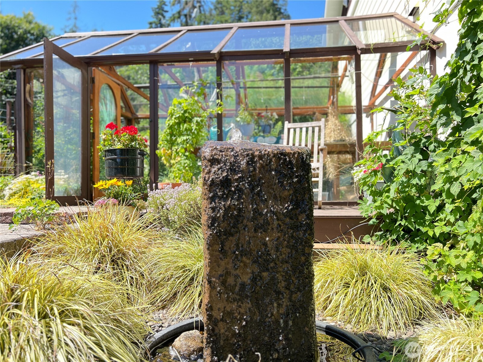 7251 Oak Bay Road Port Ludlow, WA 98365 - Photo 7 of 40 a view of a garden with plants