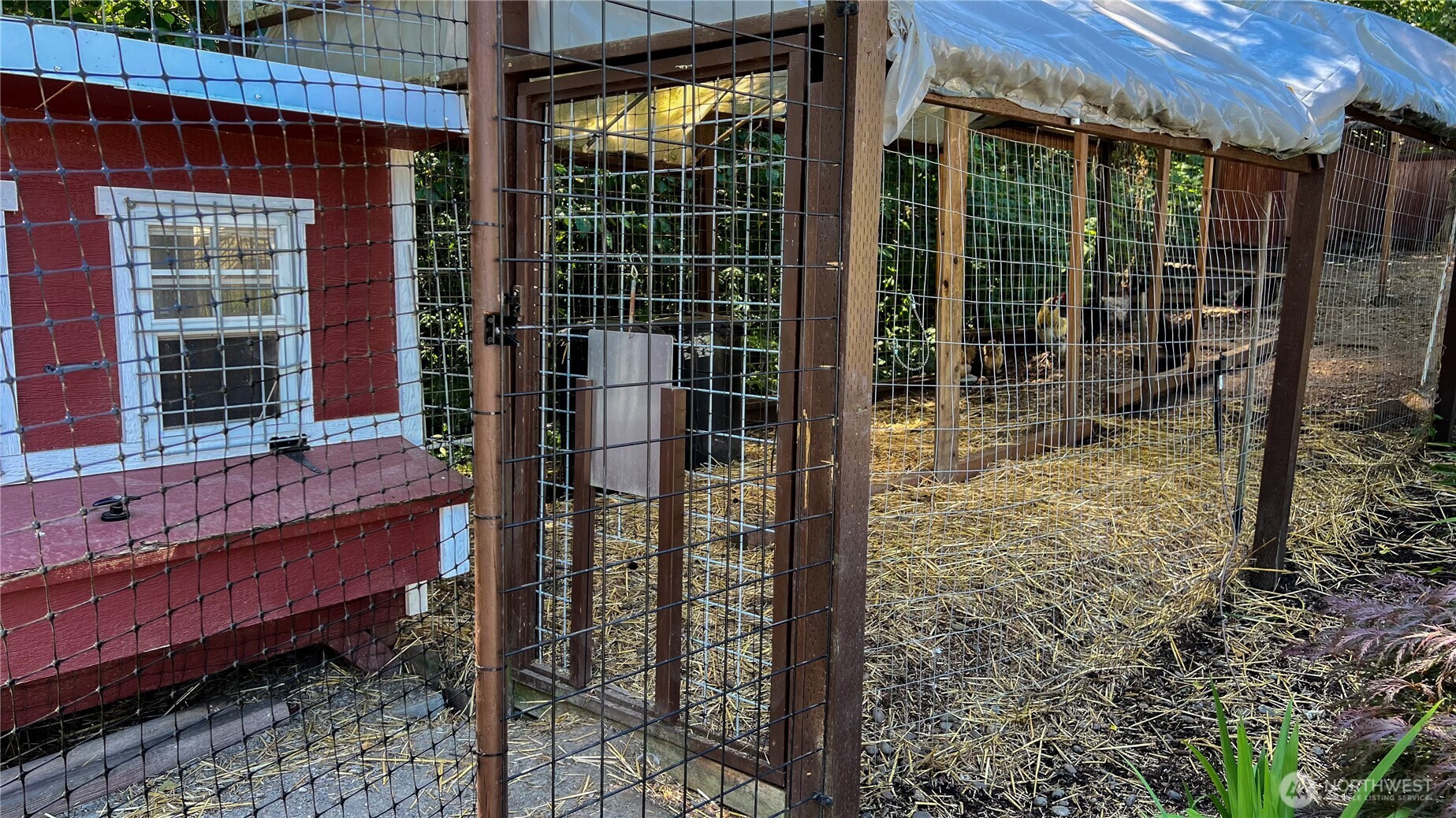 7251 Oak Bay Road Port Ludlow, WA 98365 - Photo 9 of 40 a view of a house with a outdoor space