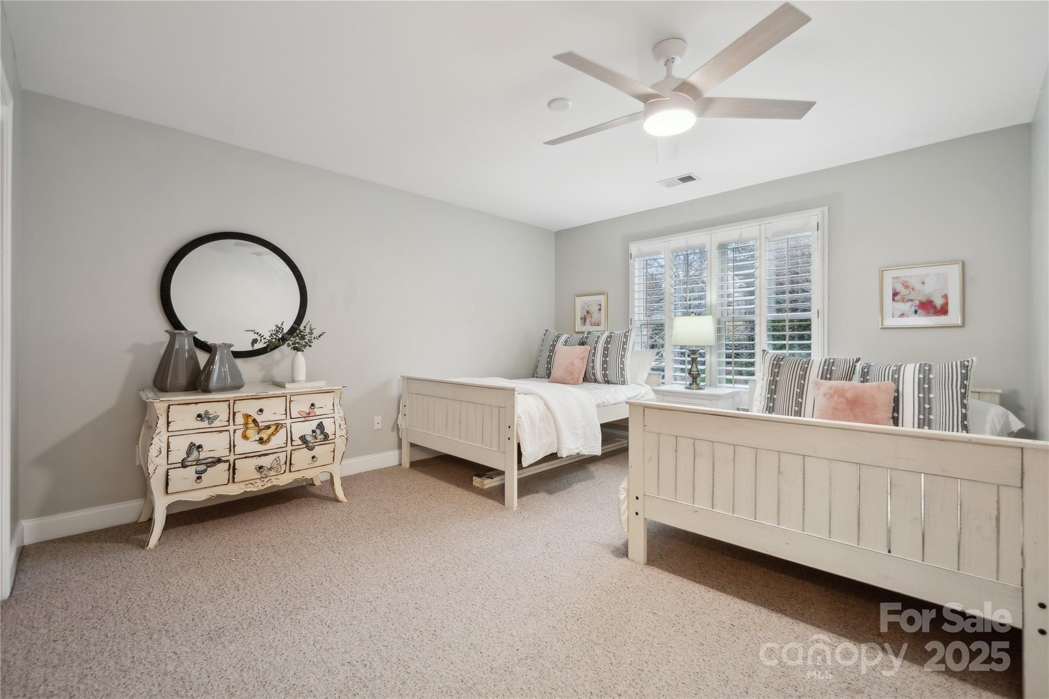 3932 Huckleberry Road Charlotte, NC 28210 - Photo 27 of 45 a bed room with furniture and a bed