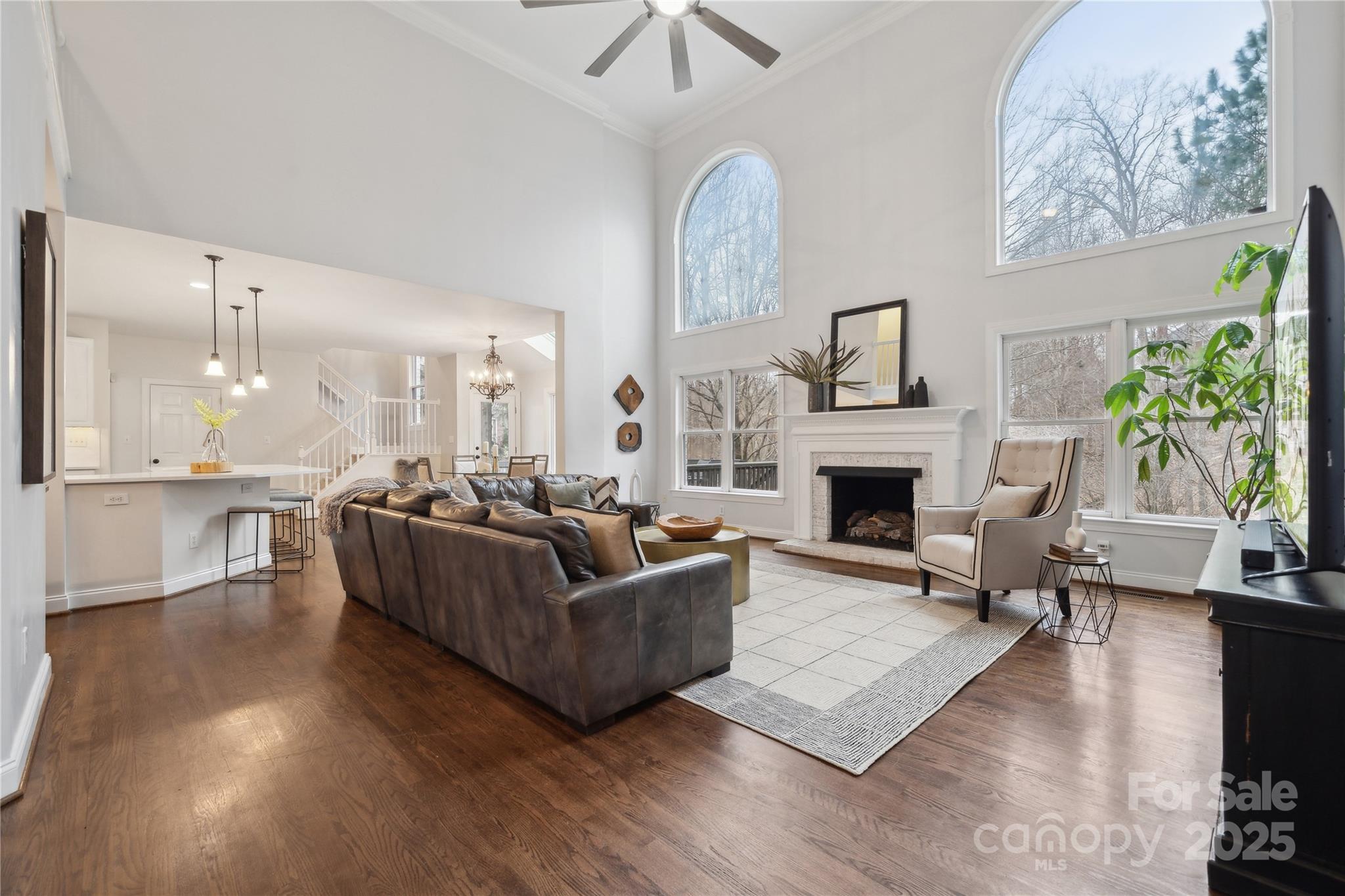 3932 Huckleberry Road Charlotte, NC 28210 - Photo 3 of 45 a living room with furniture fireplace and a large window