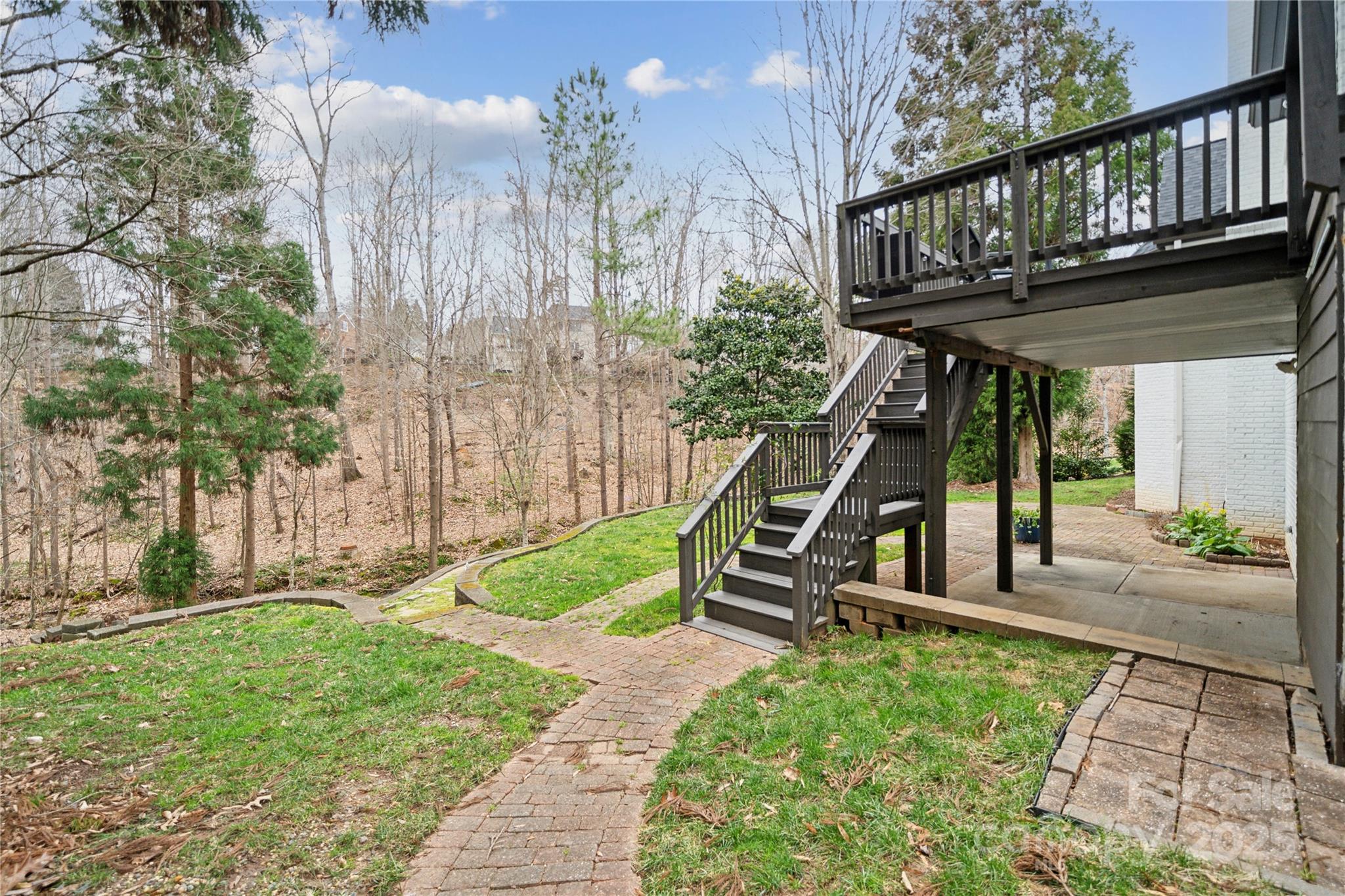 3932 Huckleberry Road Charlotte, NC 28210 - Photo 42 of 45 a view of a house with backyard and sitting area