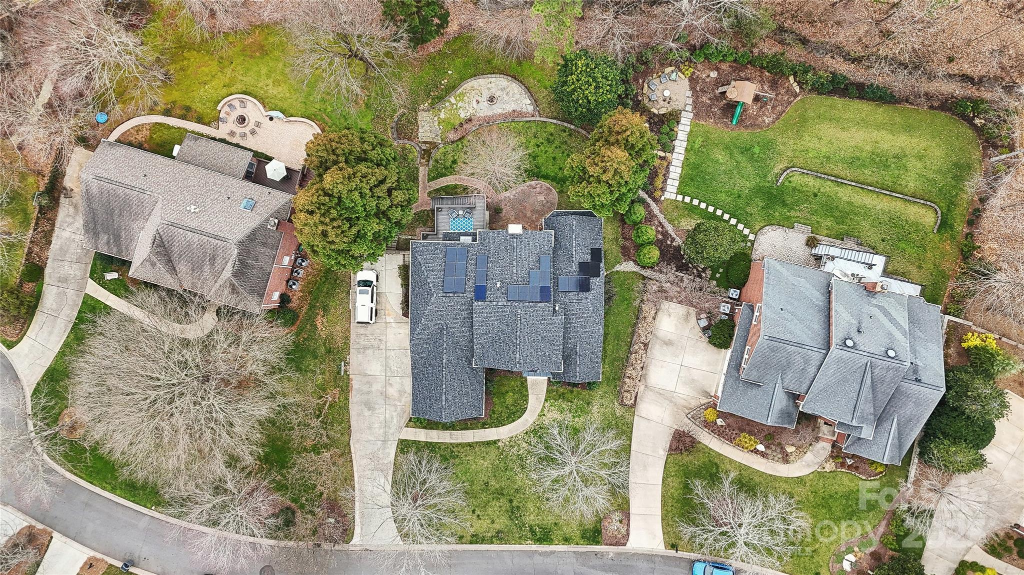 3932 Huckleberry Road Charlotte, NC 28210 - Photo 45 of 45 an aerial view of residential house with outdoor space and swimming pool