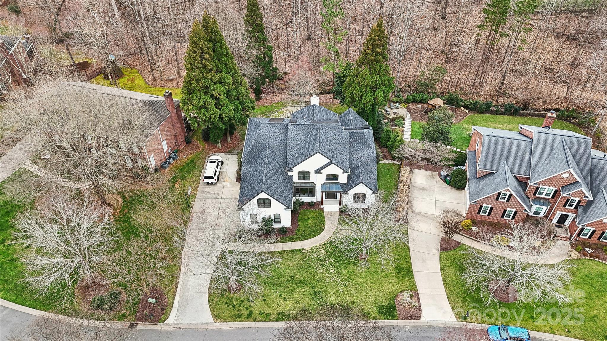 3932 Huckleberry Road Charlotte, NC 28210 - Photo 6 of 45 an aerial view of a house with outdoor space