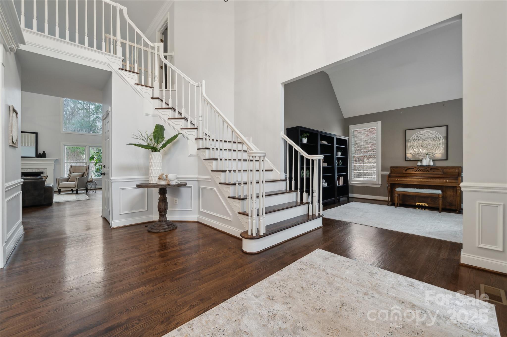 3932 Huckleberry Road Charlotte, NC 28210 - Photo 8 of 45 a view of entryway livingroom and hall with wooden floor