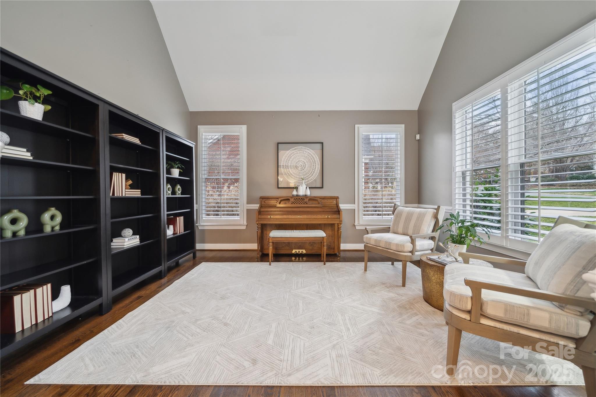 3932 Huckleberry Road Charlotte, NC 28210 - Photo 9 of 45 a living room with a couch and a large window