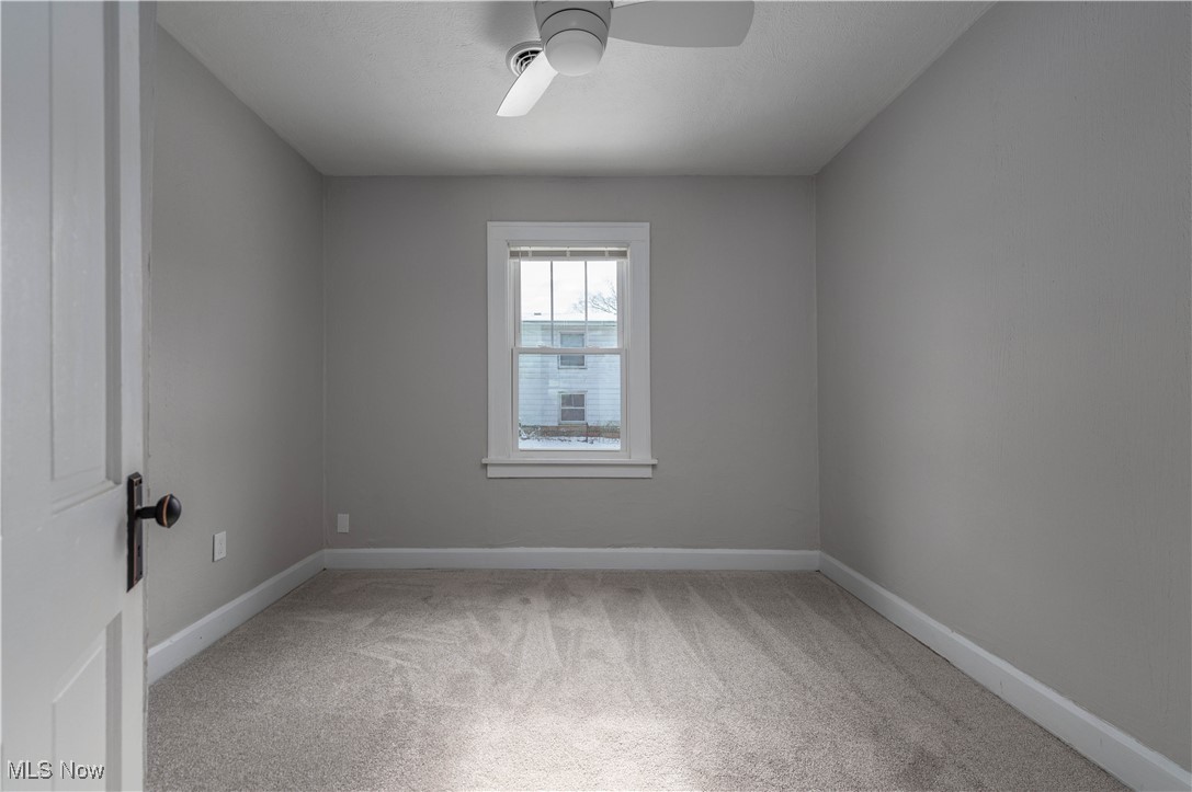 218 Roxboro Road Vermilion, OH 44089 - Photo 26 of 50 Spare room with baseboards and light carpet