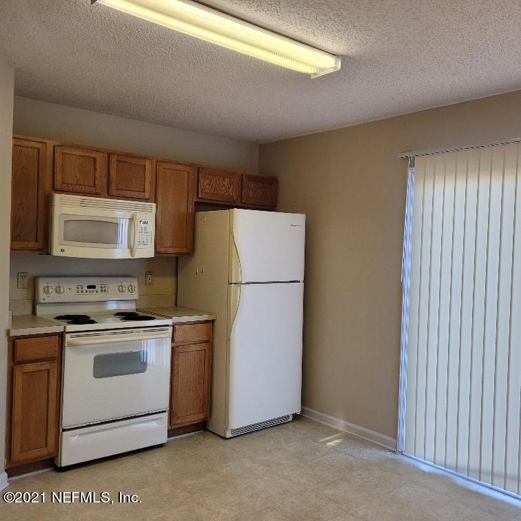 96228 Coral Reef Road Yulee, FL 32097 - Photo 5 of 7 Coral Reef Kitchen3