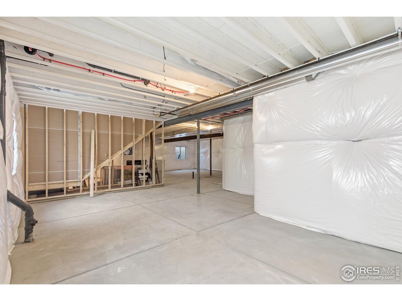 105 7th Avenue Wiggins, CO 80654 - Photo 16 of 18 unfinished basement with 9' walls