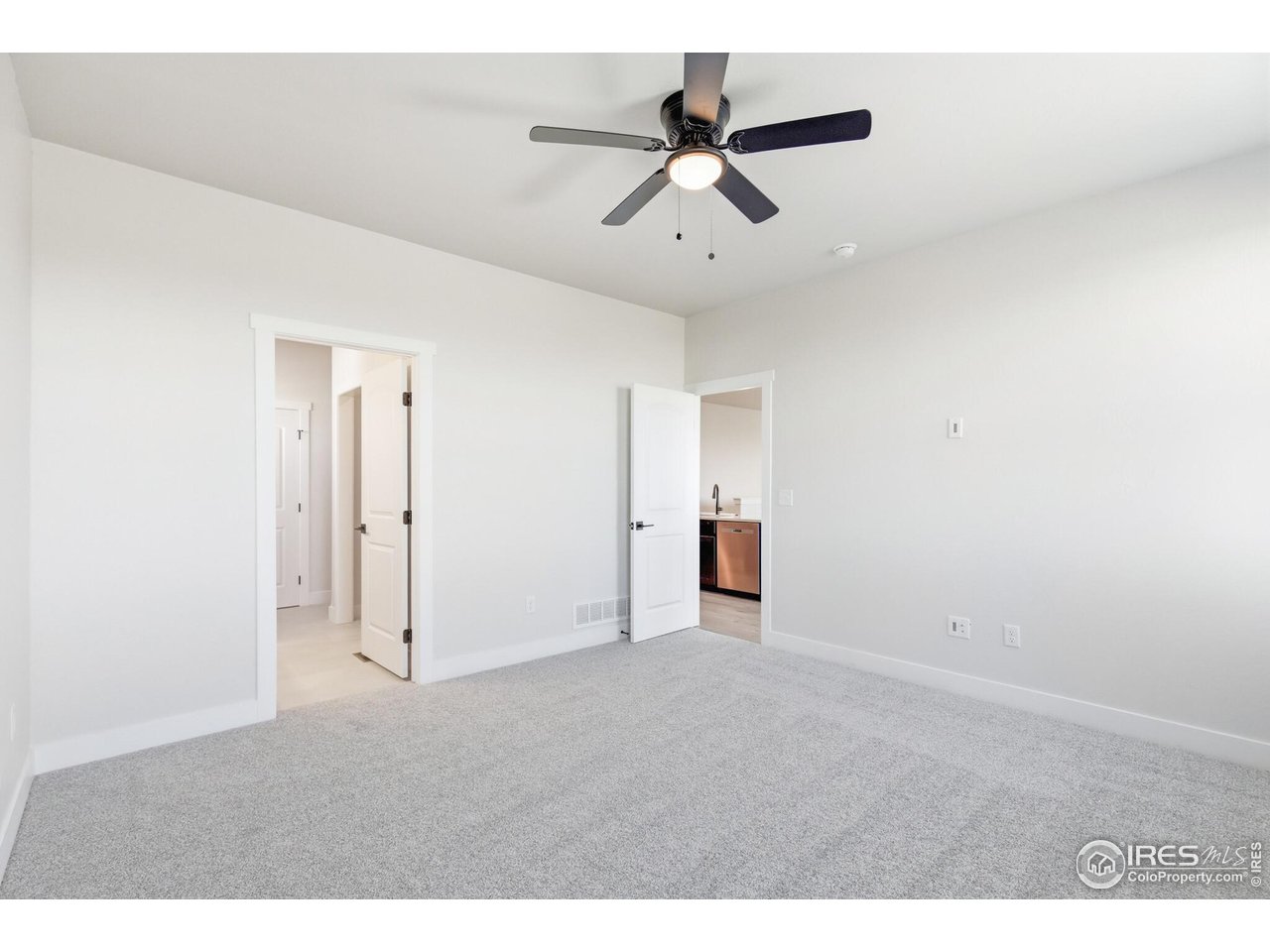 105 7th Avenue Wiggins, CO 80654 - Photo 7 of 18 Primary bedroom