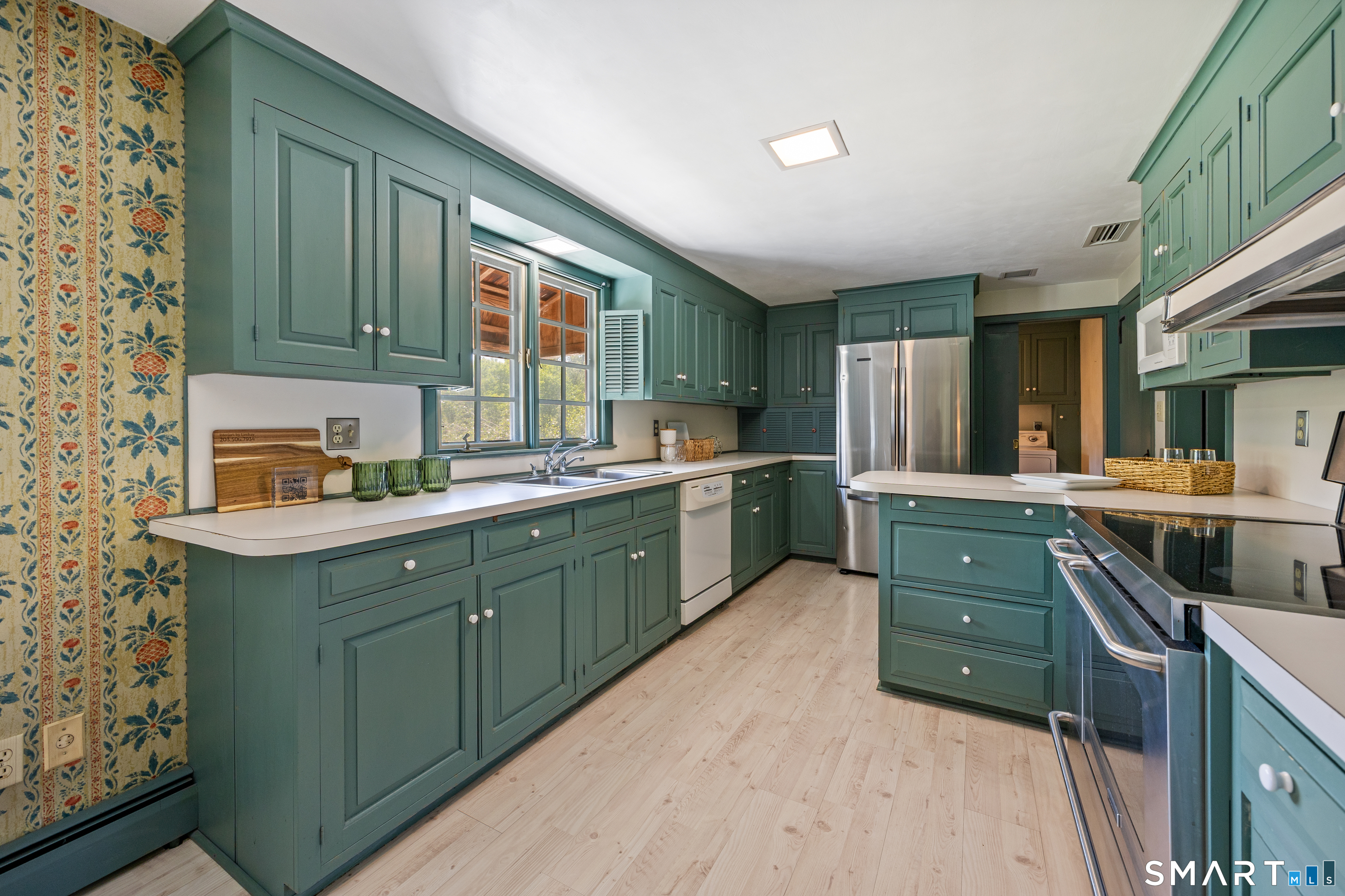 52 Susan Lane Meriden, CT 06450 - Photo 10 of 28 a kitchen with lots of counter top space and appliances