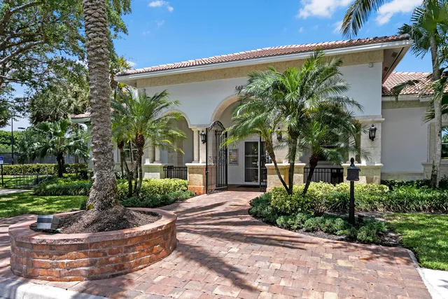 a view of a swimming pool with a yard