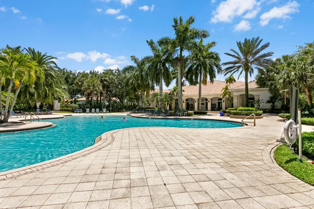 a view of a patio with swimming pool