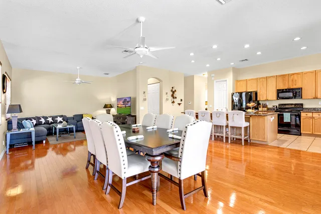 a view of a dining room with furniture