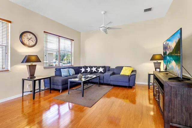 a living room with furniture and a table