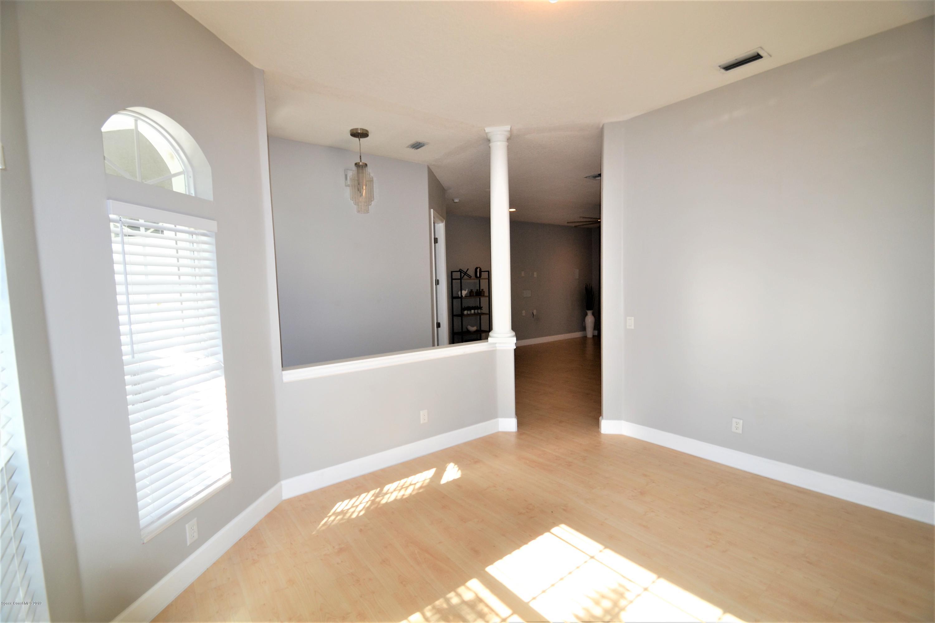 1772 Winding Ridge Circle Southeast Palm Bay, FL 32909 - Photo 11 of 62 1772 Winding Ridge Formal dining (3)