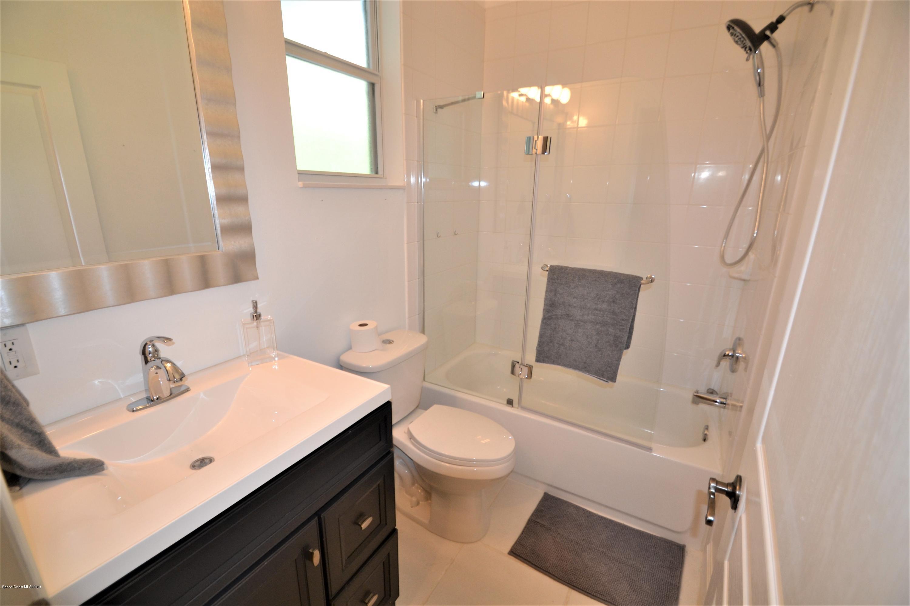 1772 Winding Ridge Circle Southeast Palm Bay, FL 32909 - Photo 45 of 62 1772 Winding Ridge Pool Bath (3)