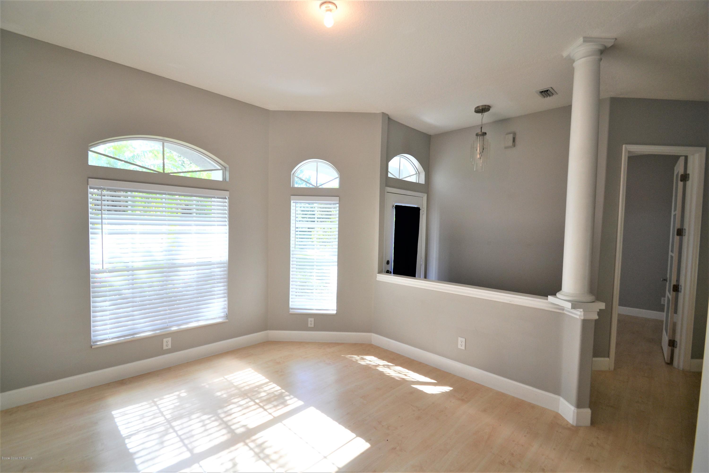 1772 Winding Ridge Circle Southeast Palm Bay, FL 32909 - Photo 10 of 62 1772 Winding Ridge Formal dining (11)