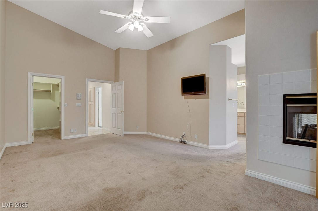 1028 Norellat Road Henderson, NV 89011 - Photo 50 of 74 Primary Bedroom with two-way fireplace.