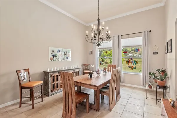 a view of a bathroom with a bathtub and wooden floor