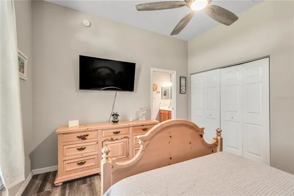 a room with furniture and a flat screen tv