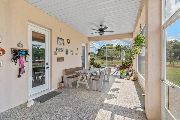 a view of a golf course with a lake view