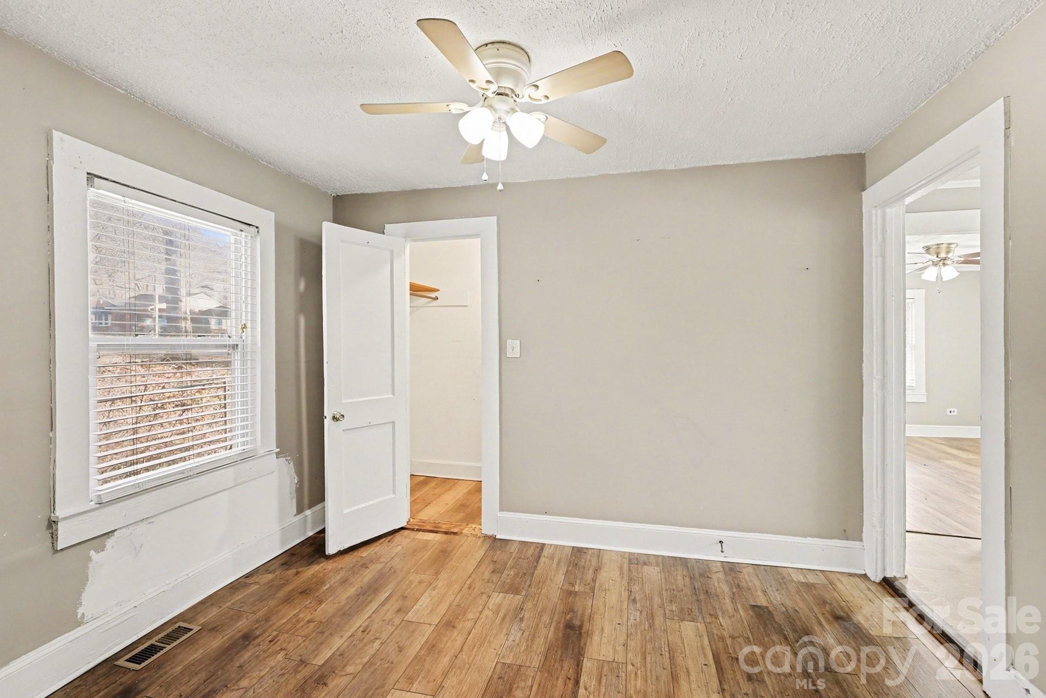 409 South Maple Street Dallas, NC 28034 - Photo 11 of 16 a view of an empty room with a window