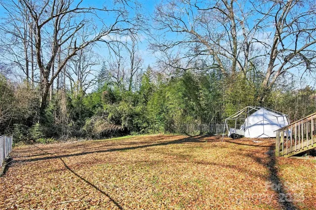 a view of backyard of house