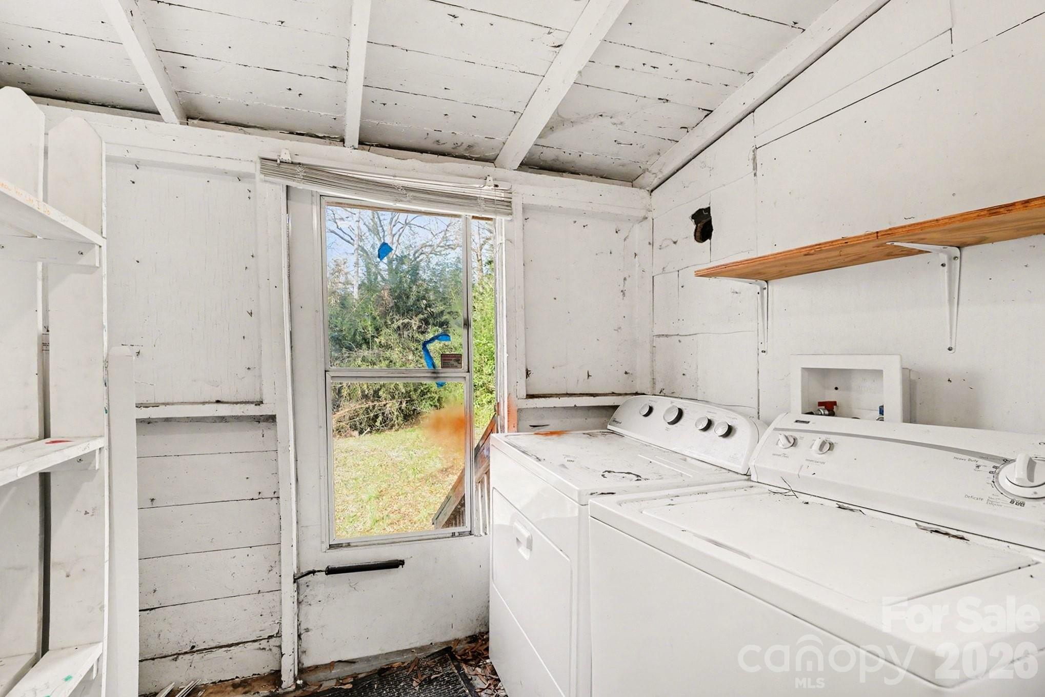 409 South Maple Street Dallas, NC 28034 - Photo 15 of 16 a utility room with dryer and washer
