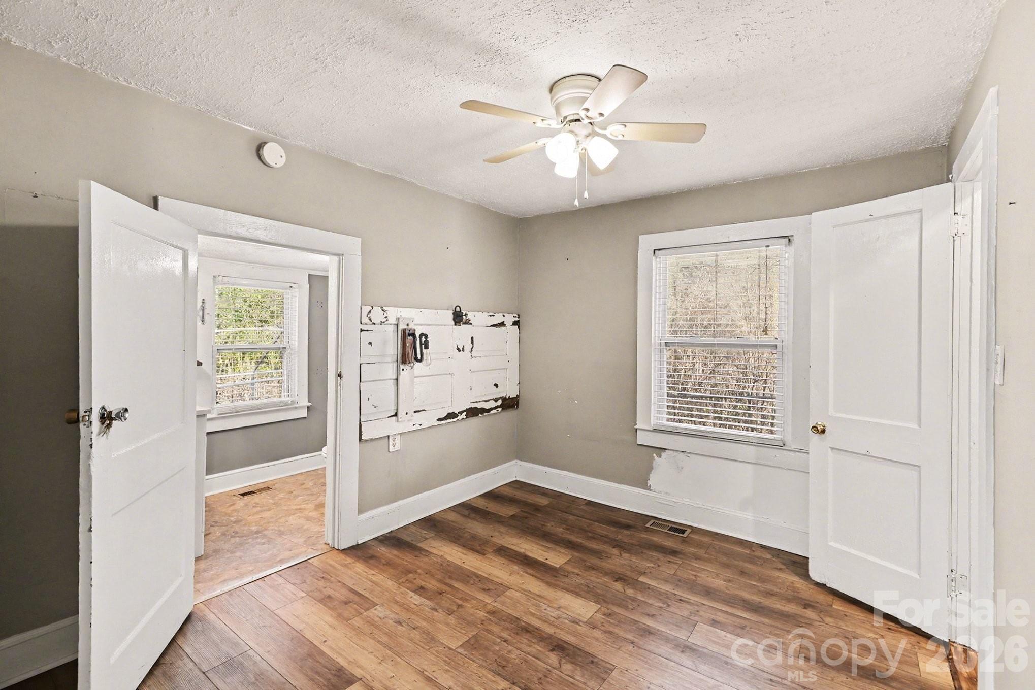 409 South Maple Street Dallas, NC 28034 - Photo 7 of 16 a view of an empty room with a window