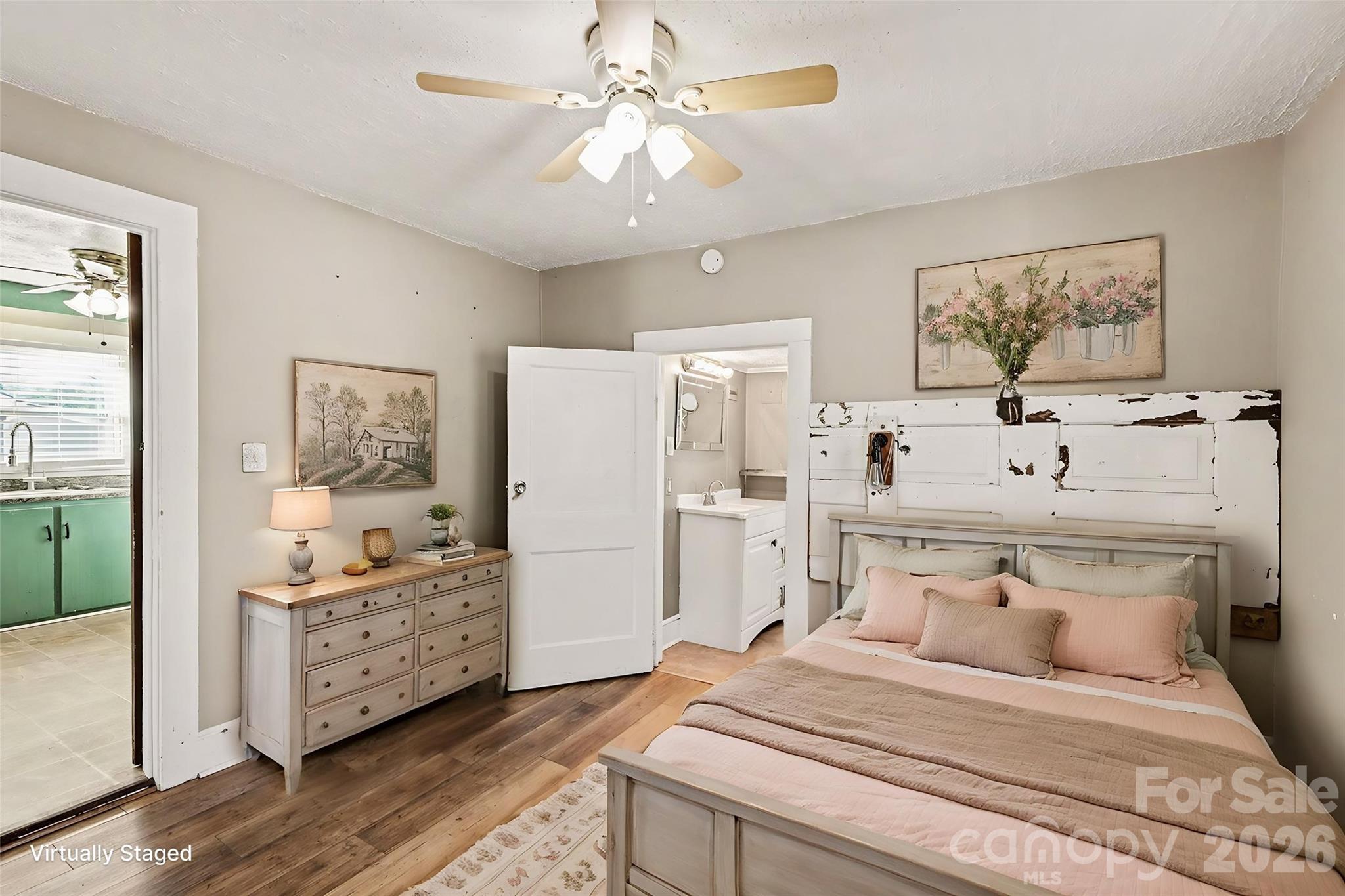 409 South Maple Street Dallas, NC 28034 - Photo 8 of 16 a bedroom with a bed dresser and window