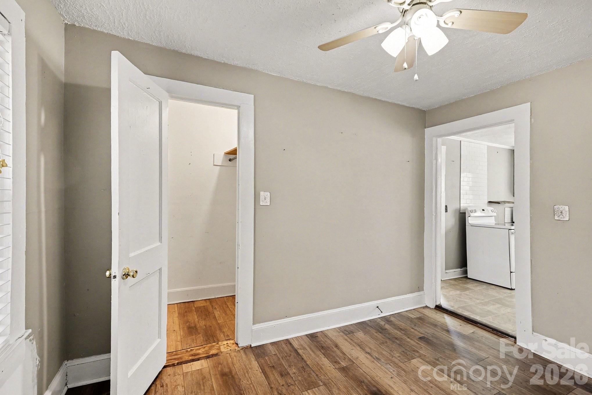 409 South Maple Street Dallas, NC 28034 - Photo 10 of 16 a view of empty room with wooden floor