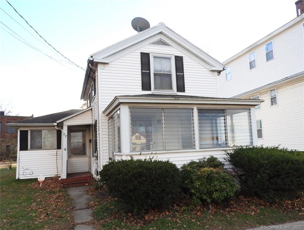 37 Spring Street Middletown, CT 06457 - Photo 1 of 1 a front view of a house with a garden