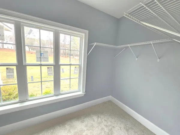 a view of a room with windows