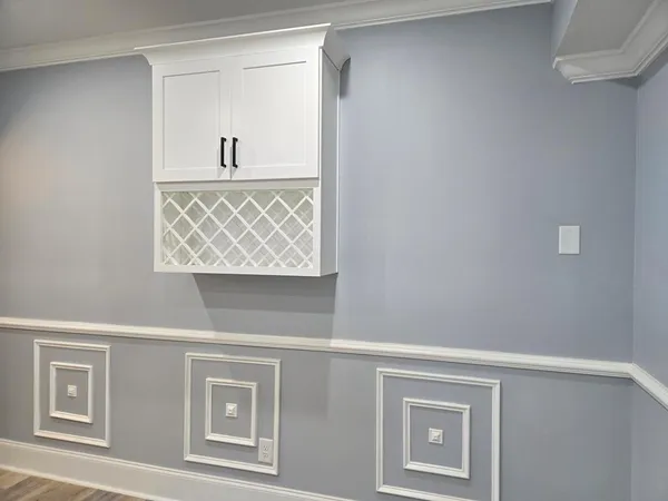 a view of an entryway with white walls