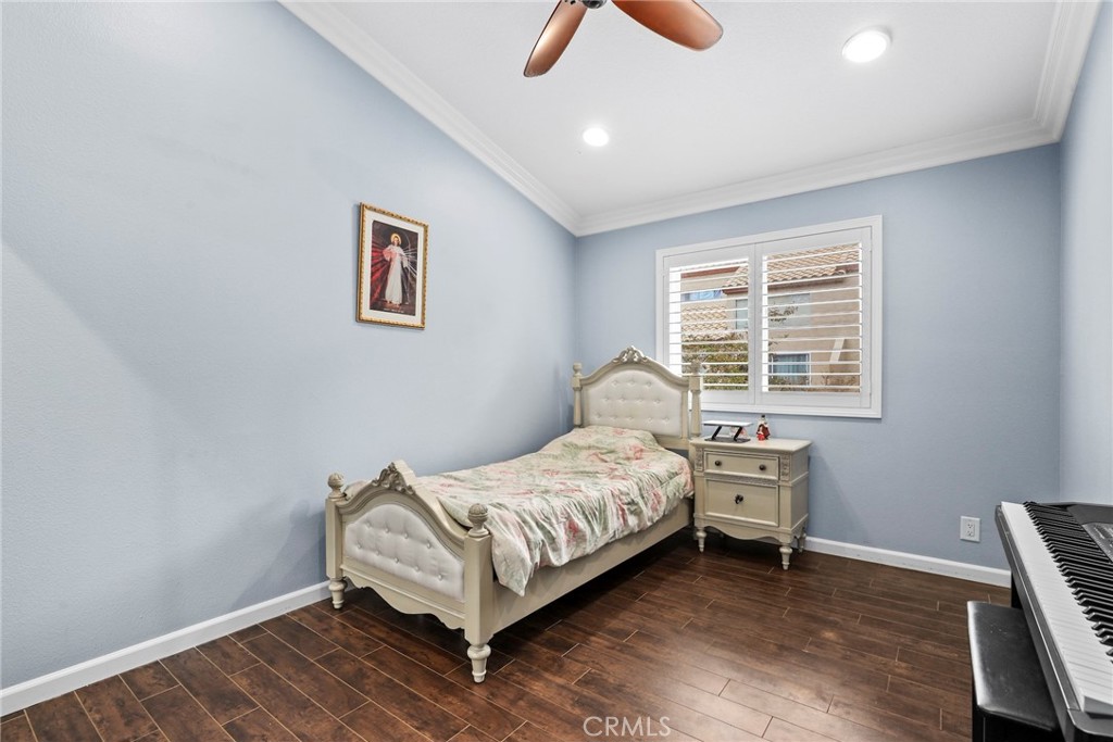 28126 Seco Canyon Road Saugus, CA 91390 - Photo 15 of 30 a bedroom with a bed and a window