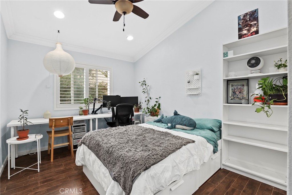 28126 Seco Canyon Road Saugus, CA 91390 - Photo 18 of 30 a bedroom with a bed and a table