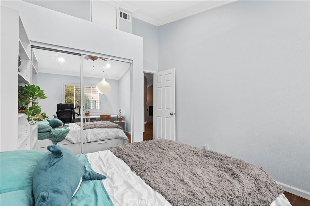 28126 Seco Canyon Road Saugus, CA 91390 - Photo 19 of 30 a bedroom with a bed window and couch