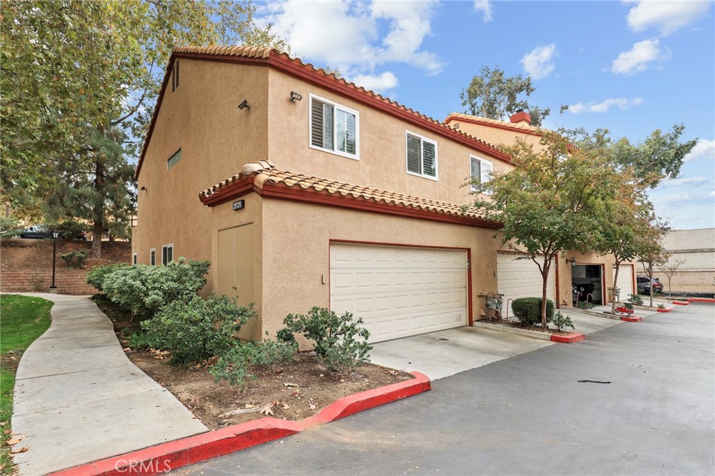 28126 Seco Canyon Road Saugus, CA 91390 - Photo 23 of 30 a group of cars parked in front of a house