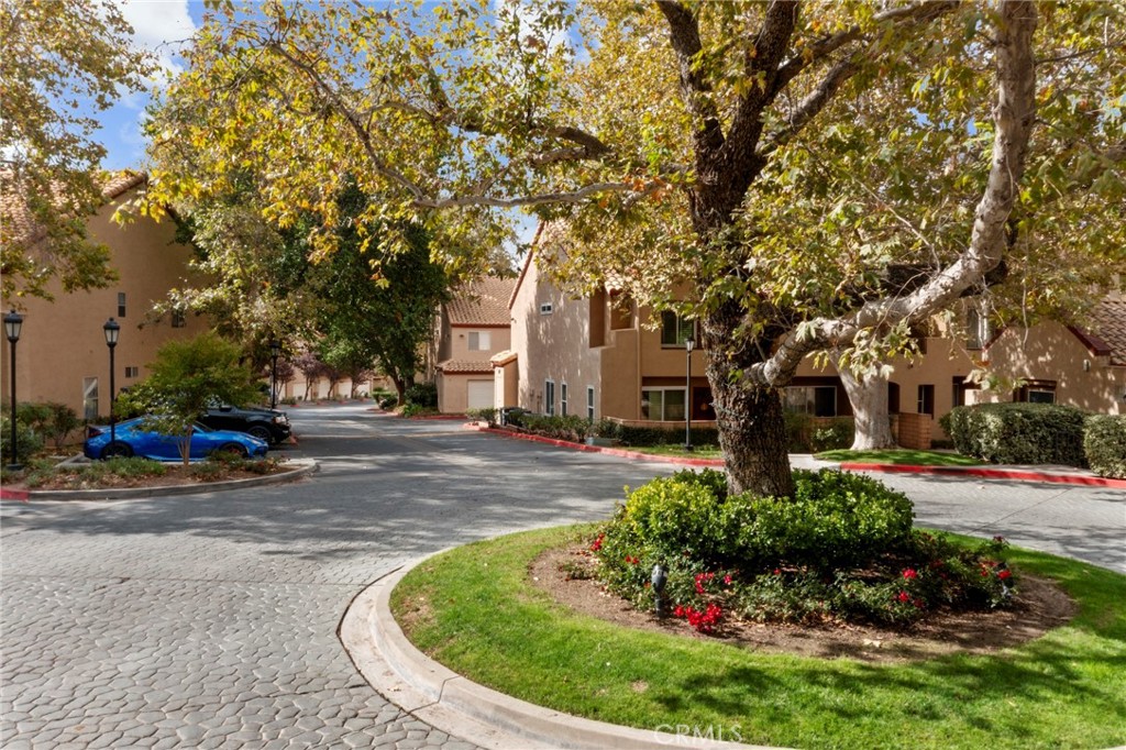 28126 Seco Canyon Road Saugus, CA 91390 - Photo 26 of 30 a view of a fountain in front of a house