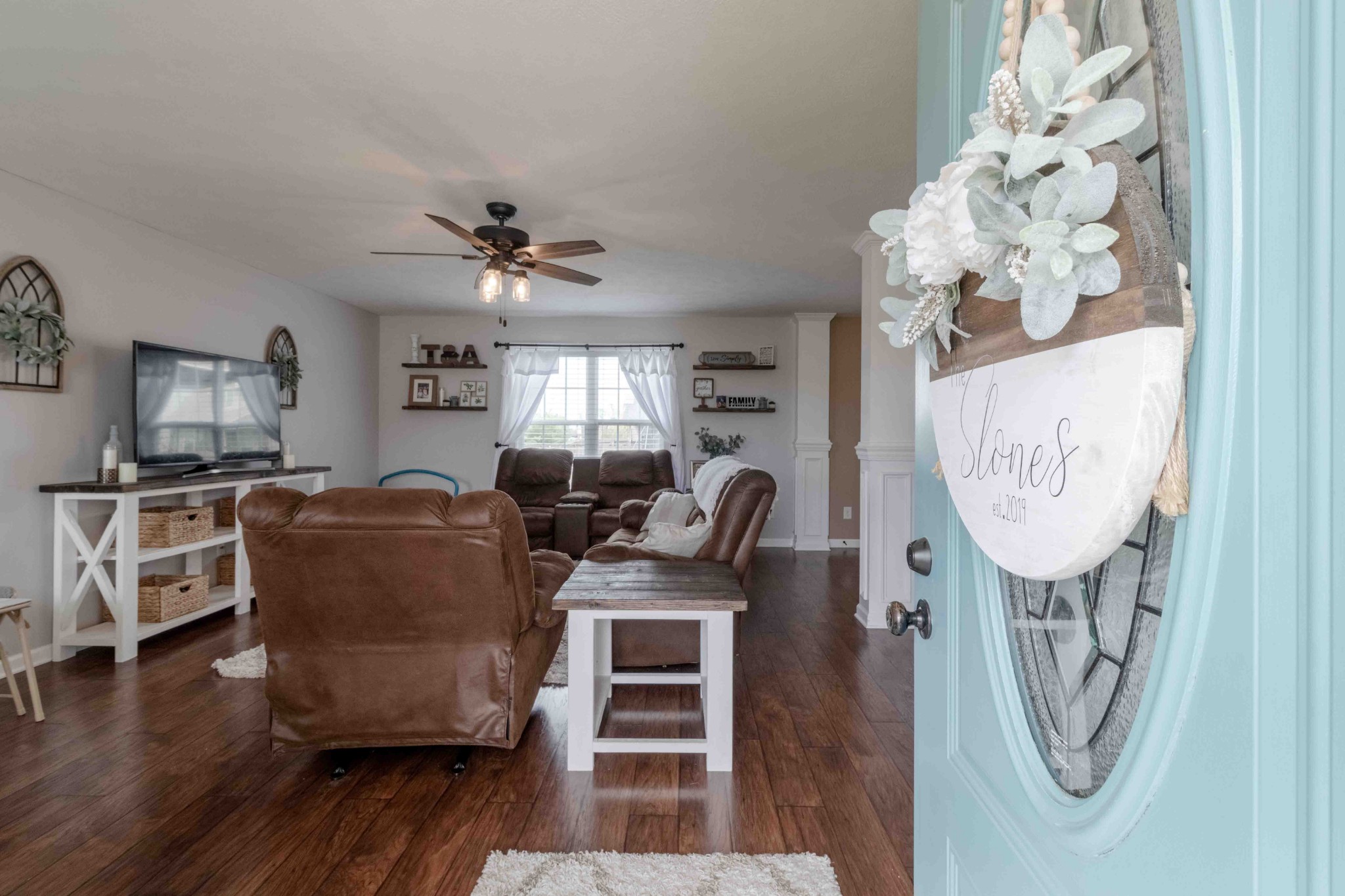 3748 Suiter Road Clarksville, TN 37040 - Photo 3 of 19 a living room with furniture a flat screen tv and a window